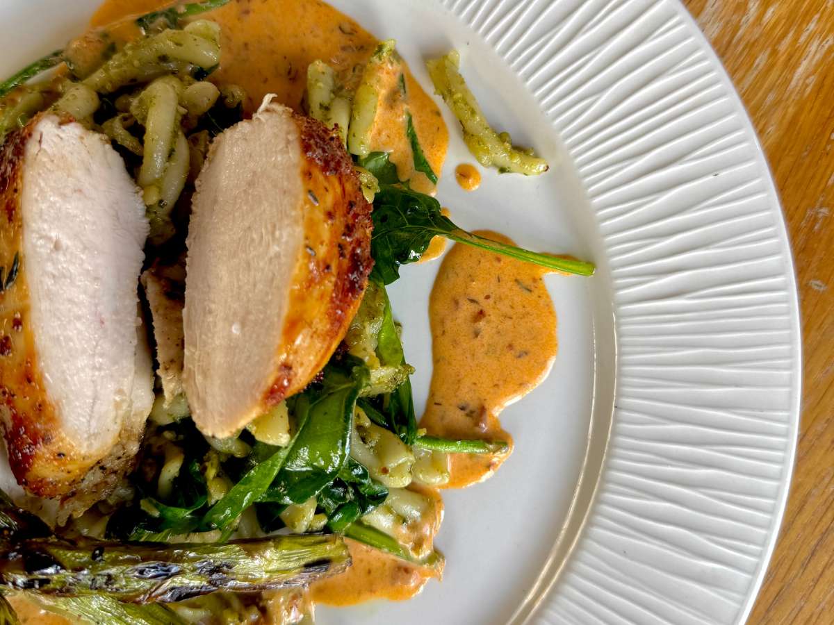 Honey lemon chicken served with seasonal vegetables and fresh herbs at Forage Farm Shop & Kitchen.