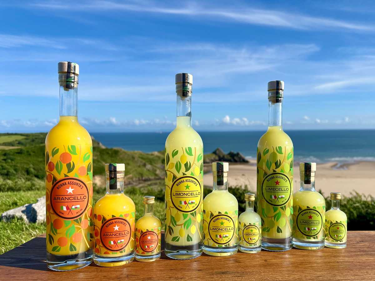 Nonna Assunta's colourful bottles of limoncello arranged in the Welsh sunshine.